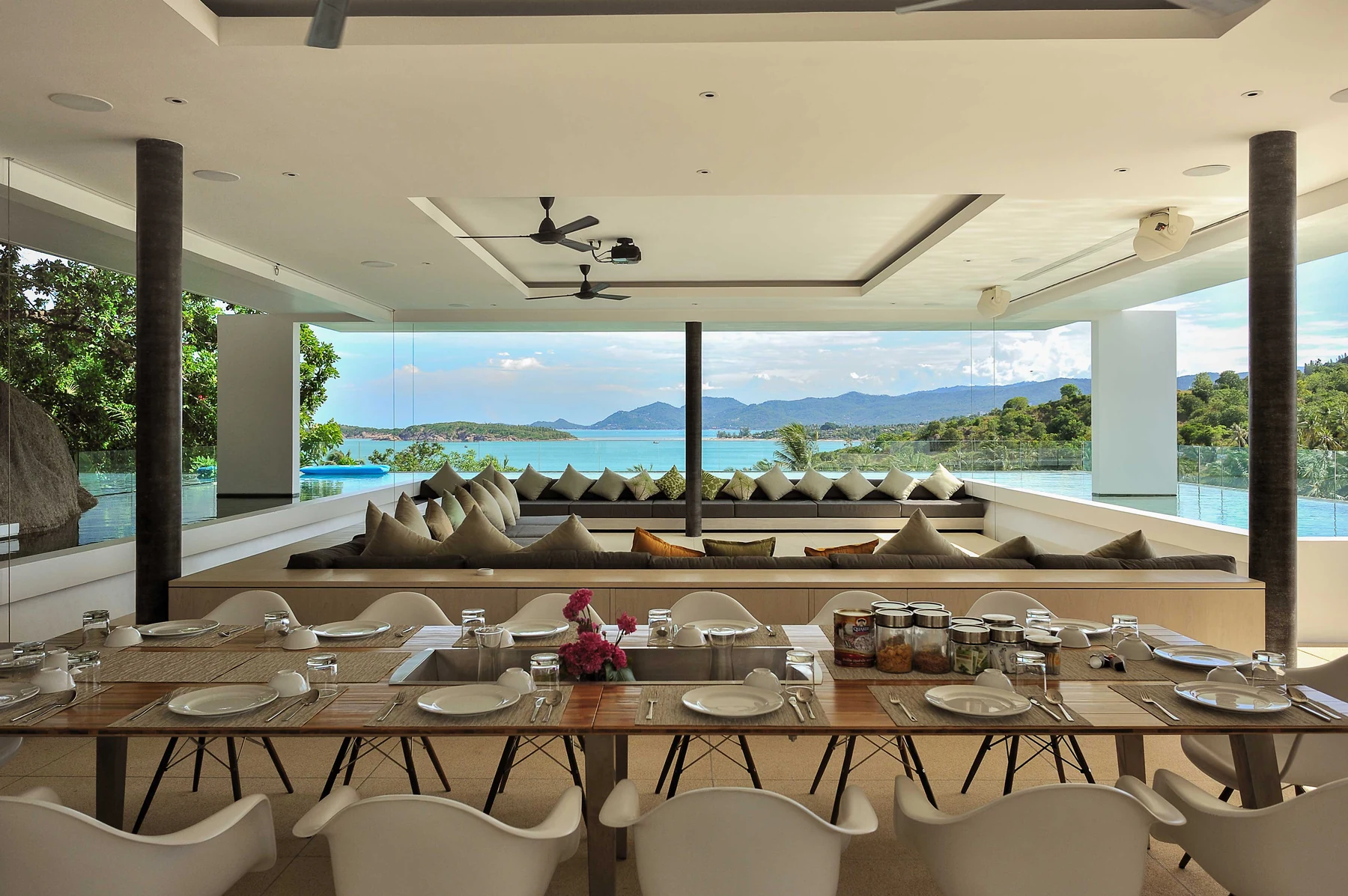 Samujana 12 — villa living and dining spaces overlooking the sea